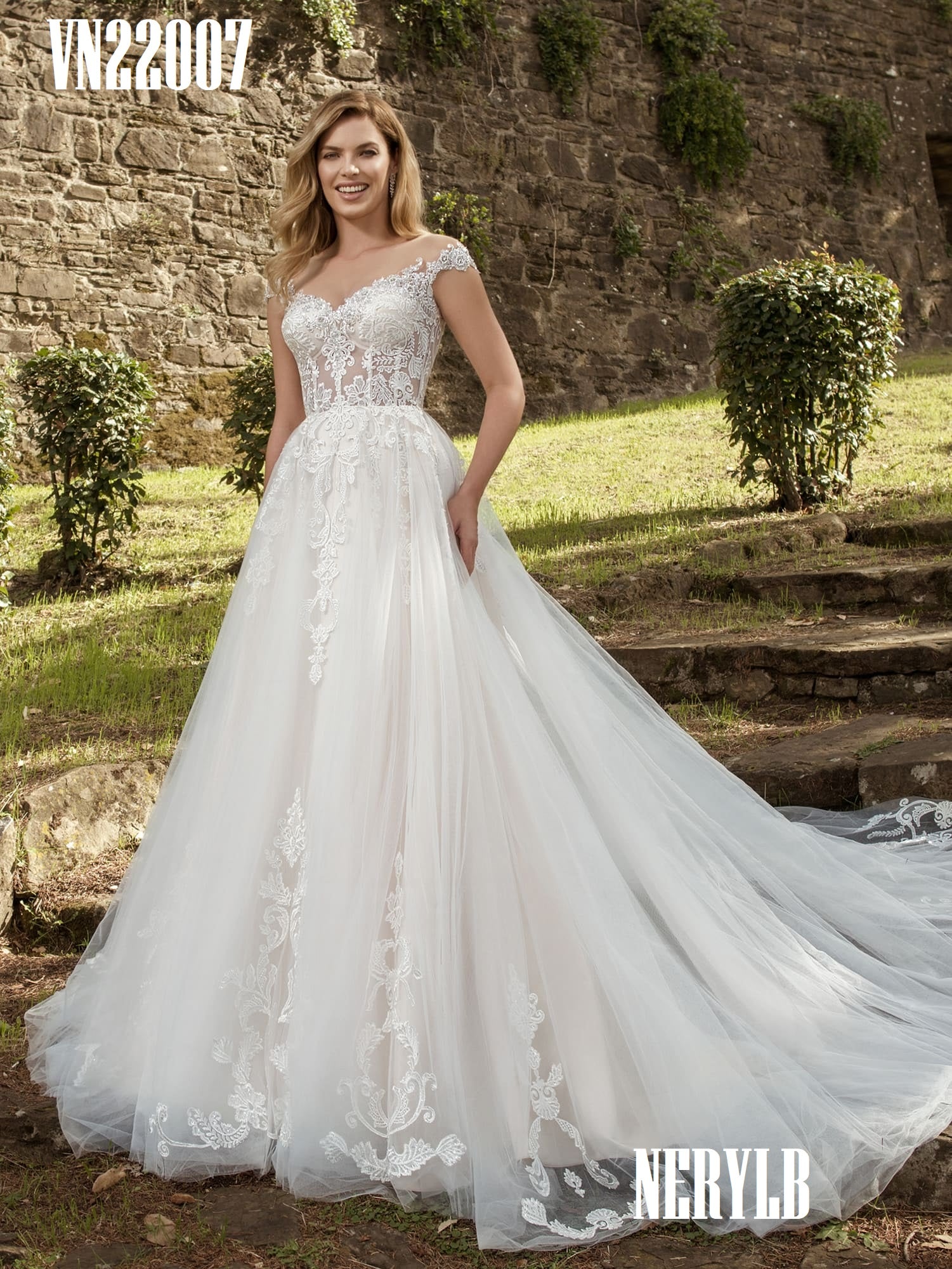 VN22007 Ivory tone wedding dress with puffy light skirt and nude top VN22007 Ivory tone wedding dress with puffy light skirt and nude top