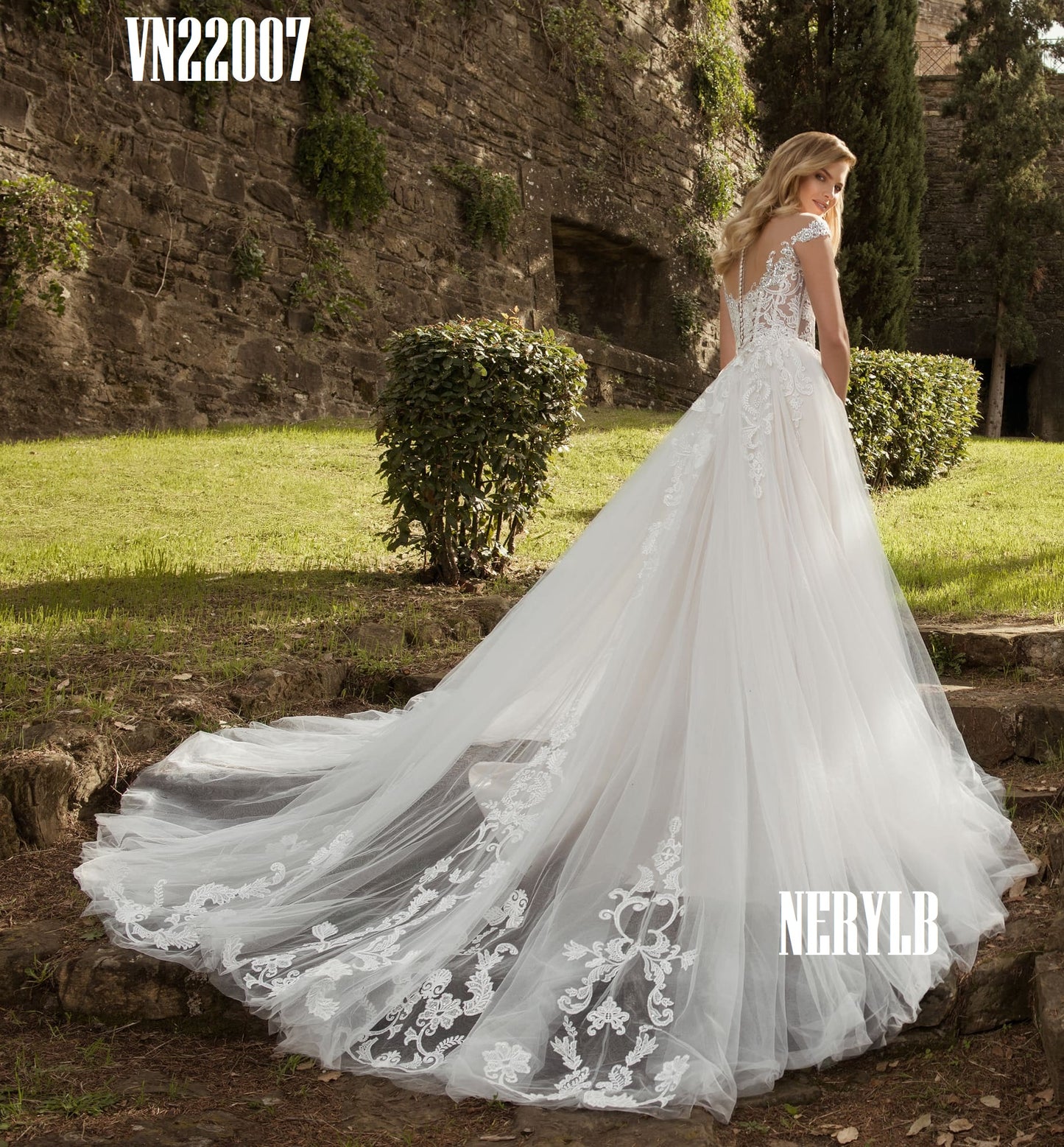 VN22007 Ivory tone wedding dress with puffy light skirt and nude top